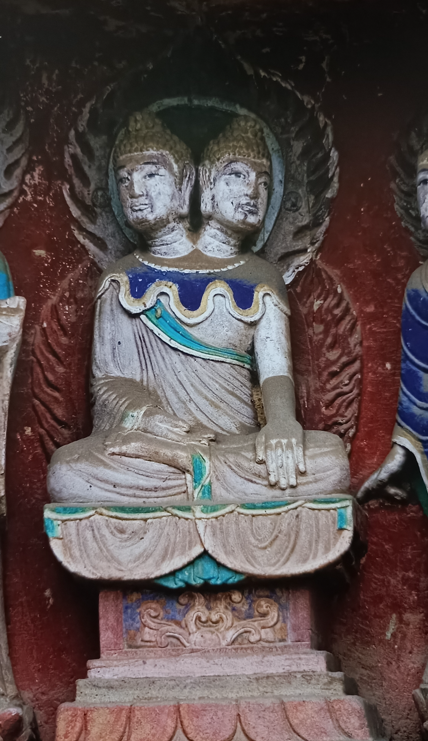 Close view of the double-headed sculpture at Nankan
