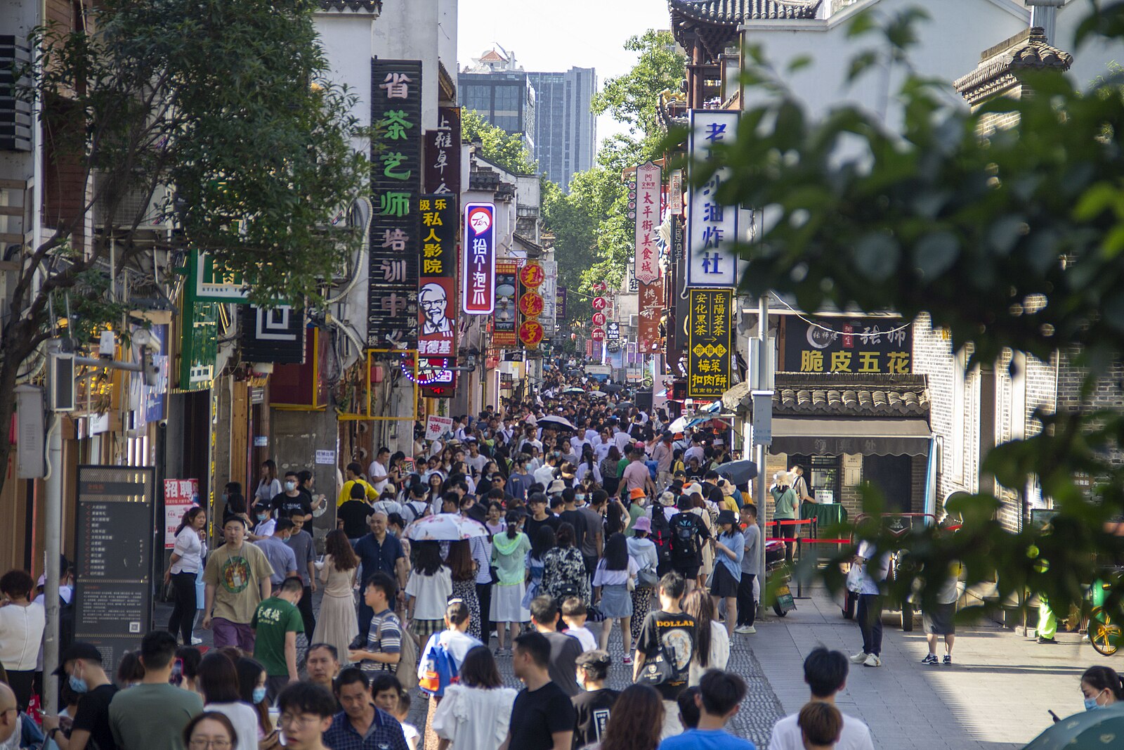 Crowded pedestrian scene along Taiping Street