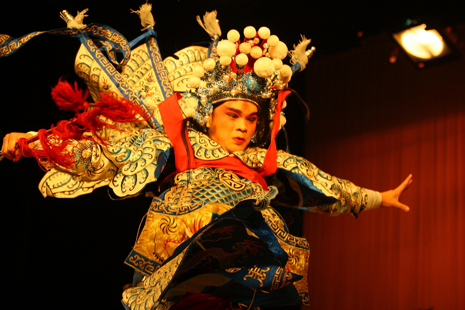 Costumed Sichuan-opera performer on a Chongqing stage