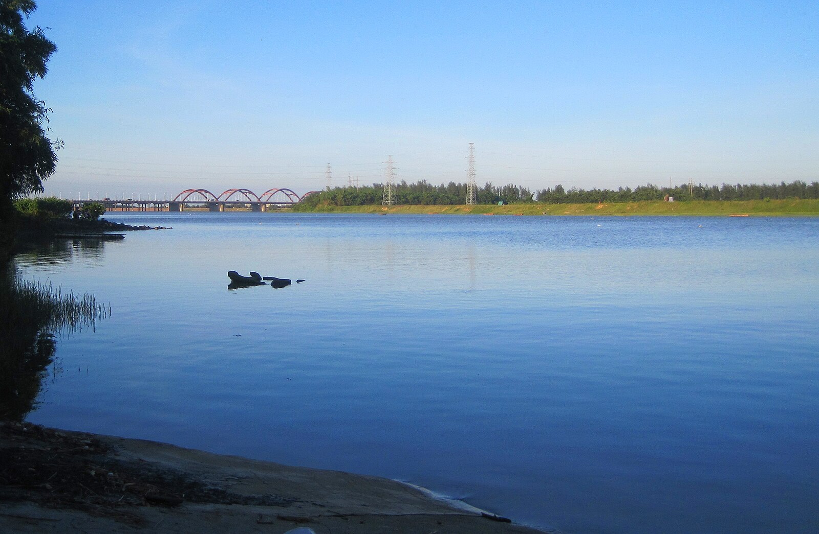 Nandu River, bridge and wooded banks inside Haikou Municipality