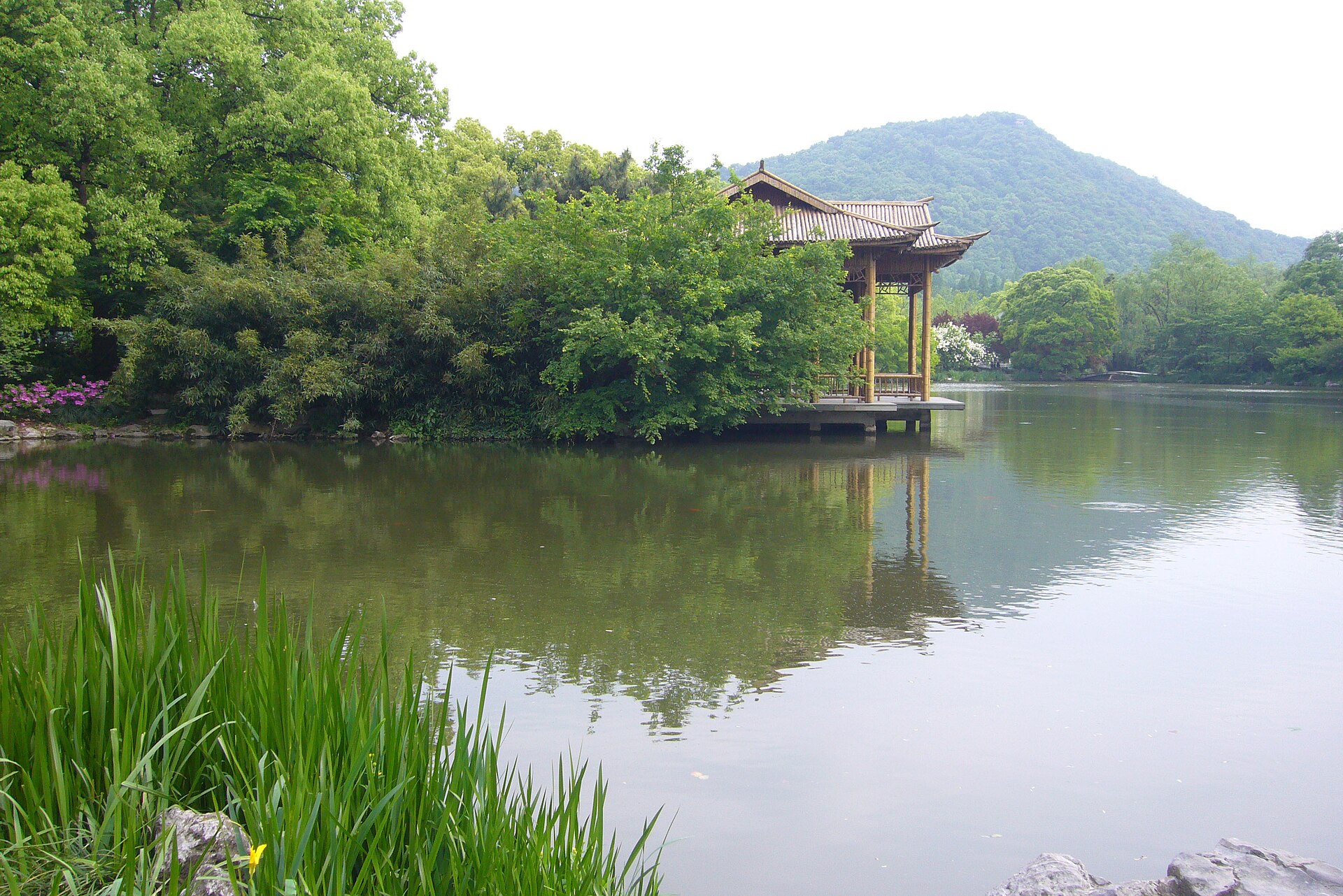 Managed waterway, vegetation and pavilion in Xixi Wetland