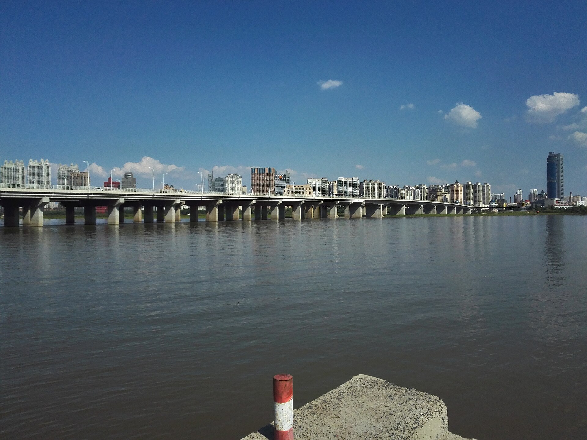 Summer Songhua River, bridge and skyline in Harbin
