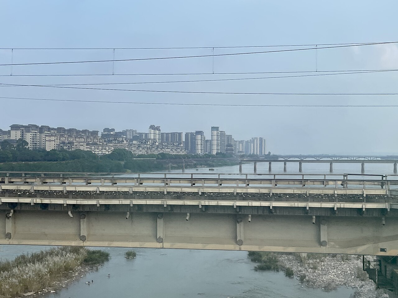 Railway bridges crossing the Qingyi River in Jiajiang County