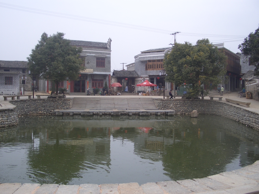 Pond and historic-village setting in Luotian, Anyi County