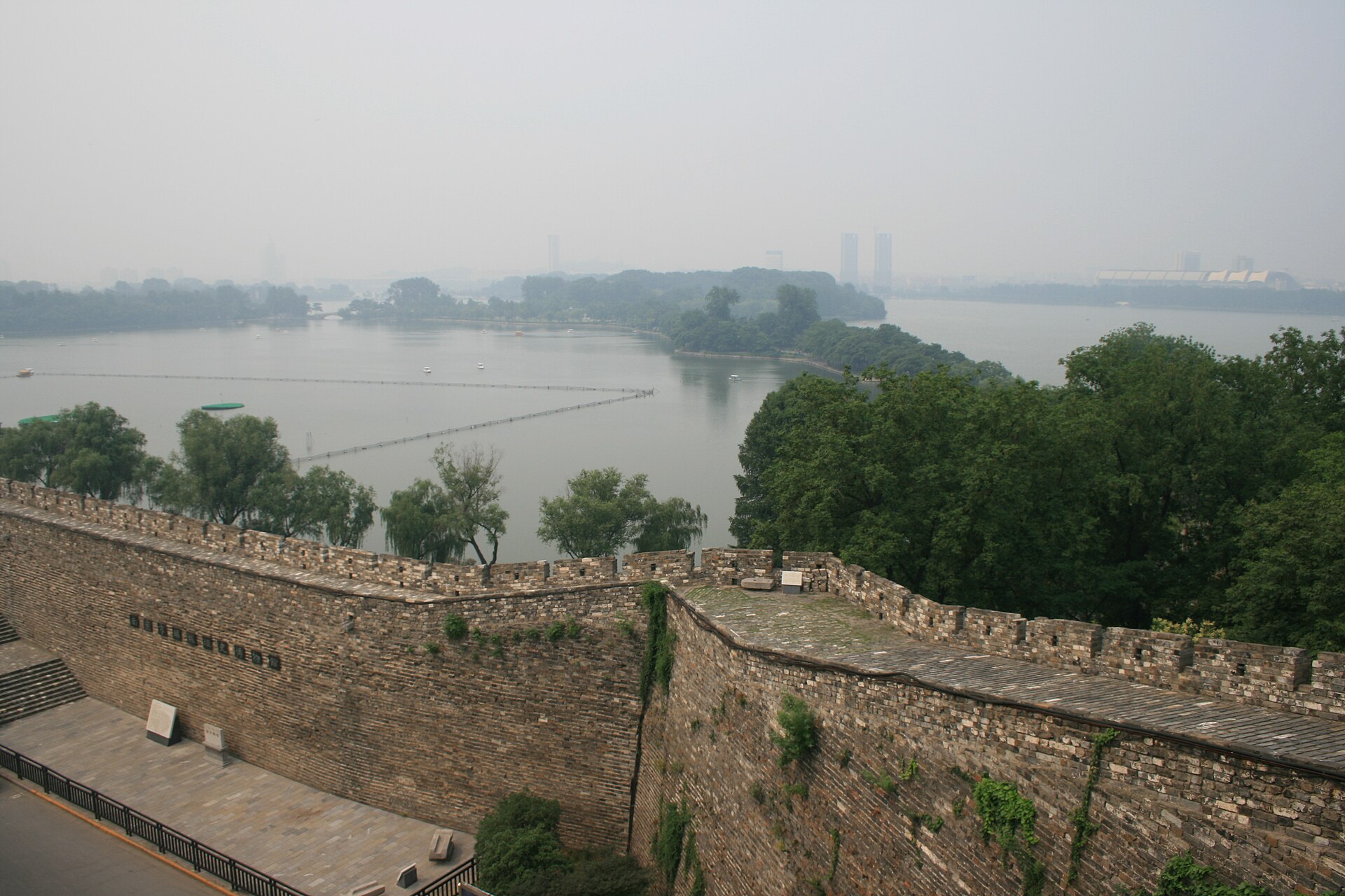 Hazy 2009 view of Nanjing City Wall beside Xuanwu Lake