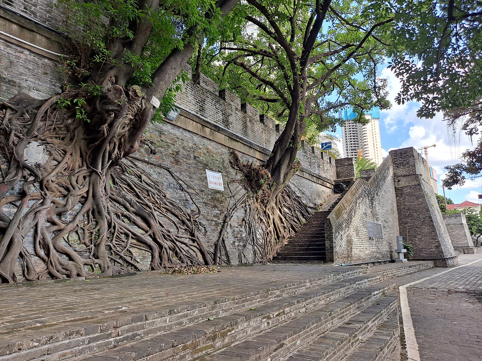 Conserved masonry wall and present public setting in central Nanning