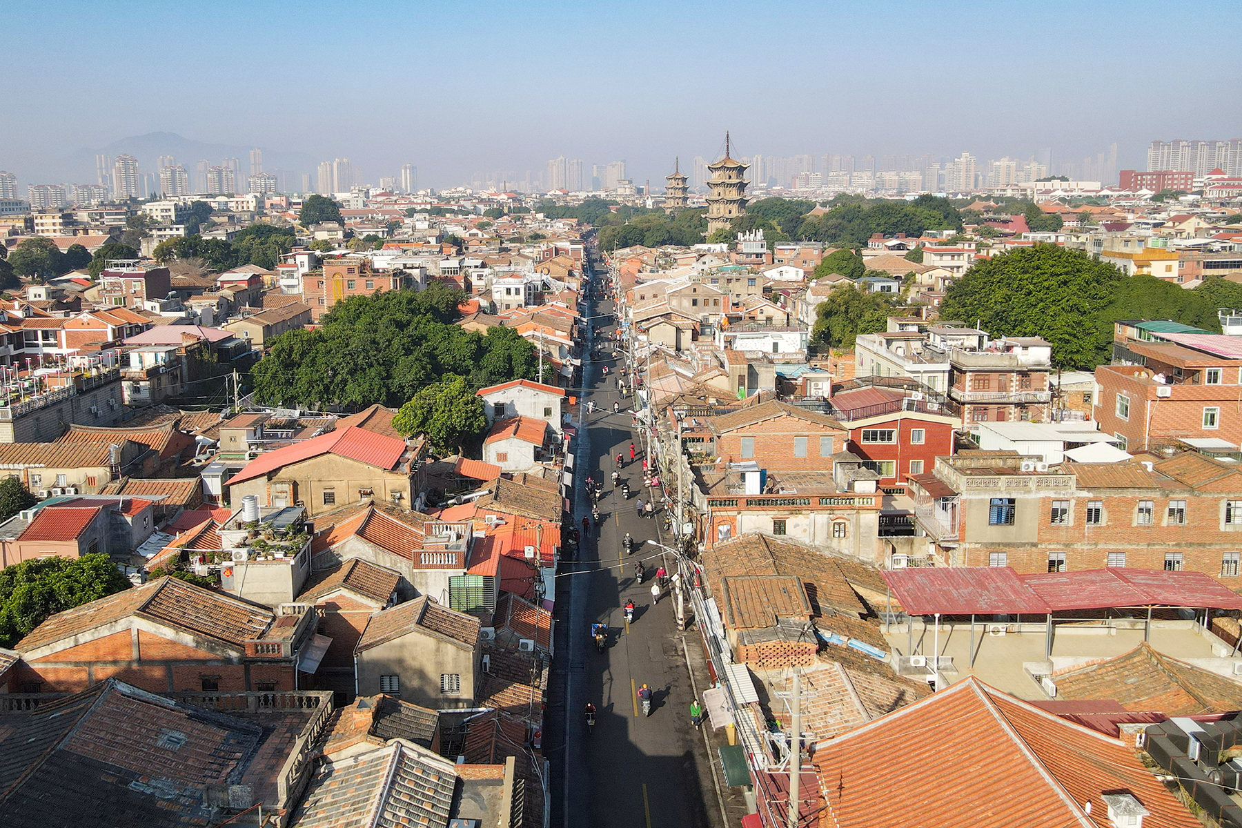 Elevated view along West Street toward Kaiyuan Temple pagodas and modern buildings