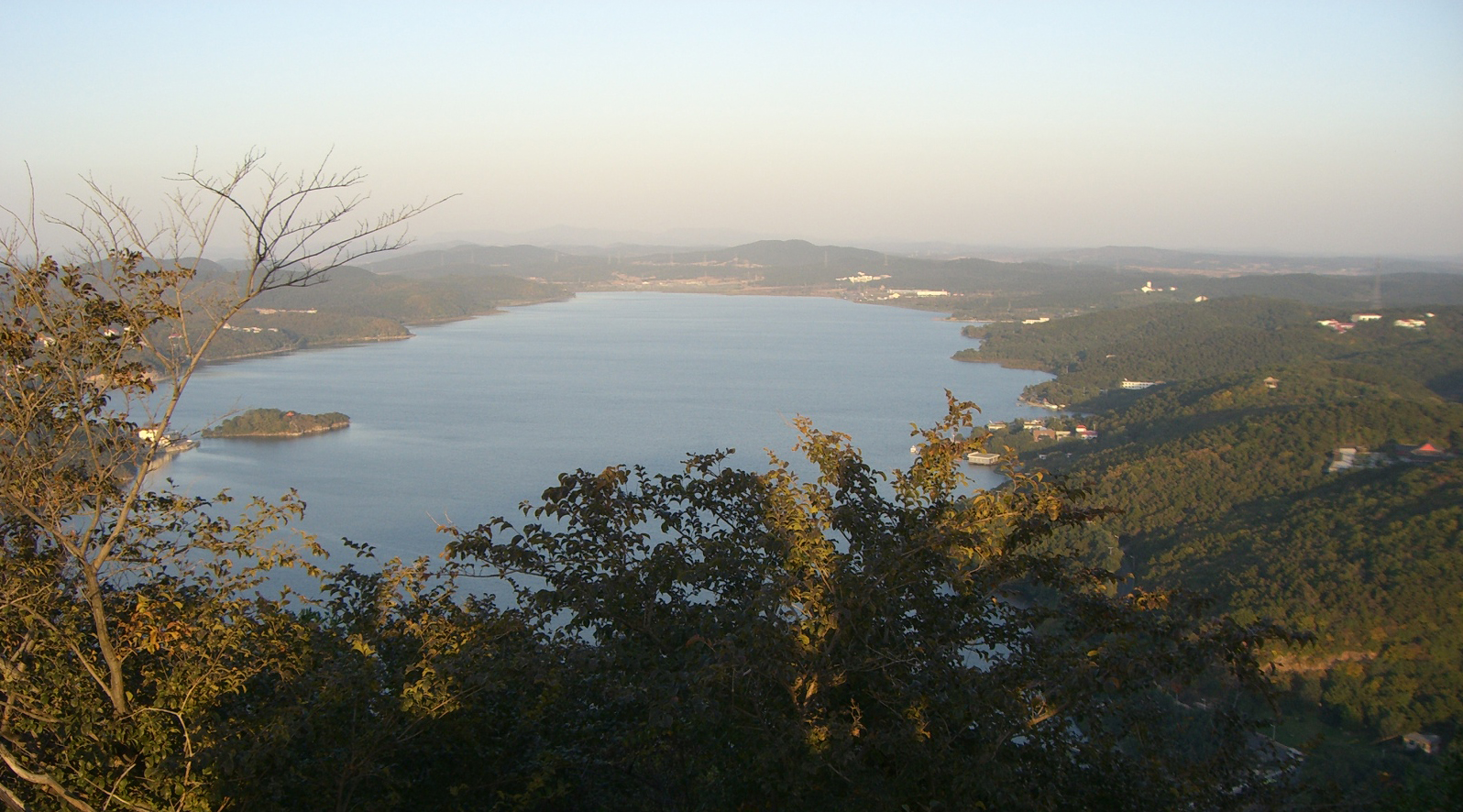 Lake Xiu and forested ridges in eastern Shenyang's Qipanshan Park