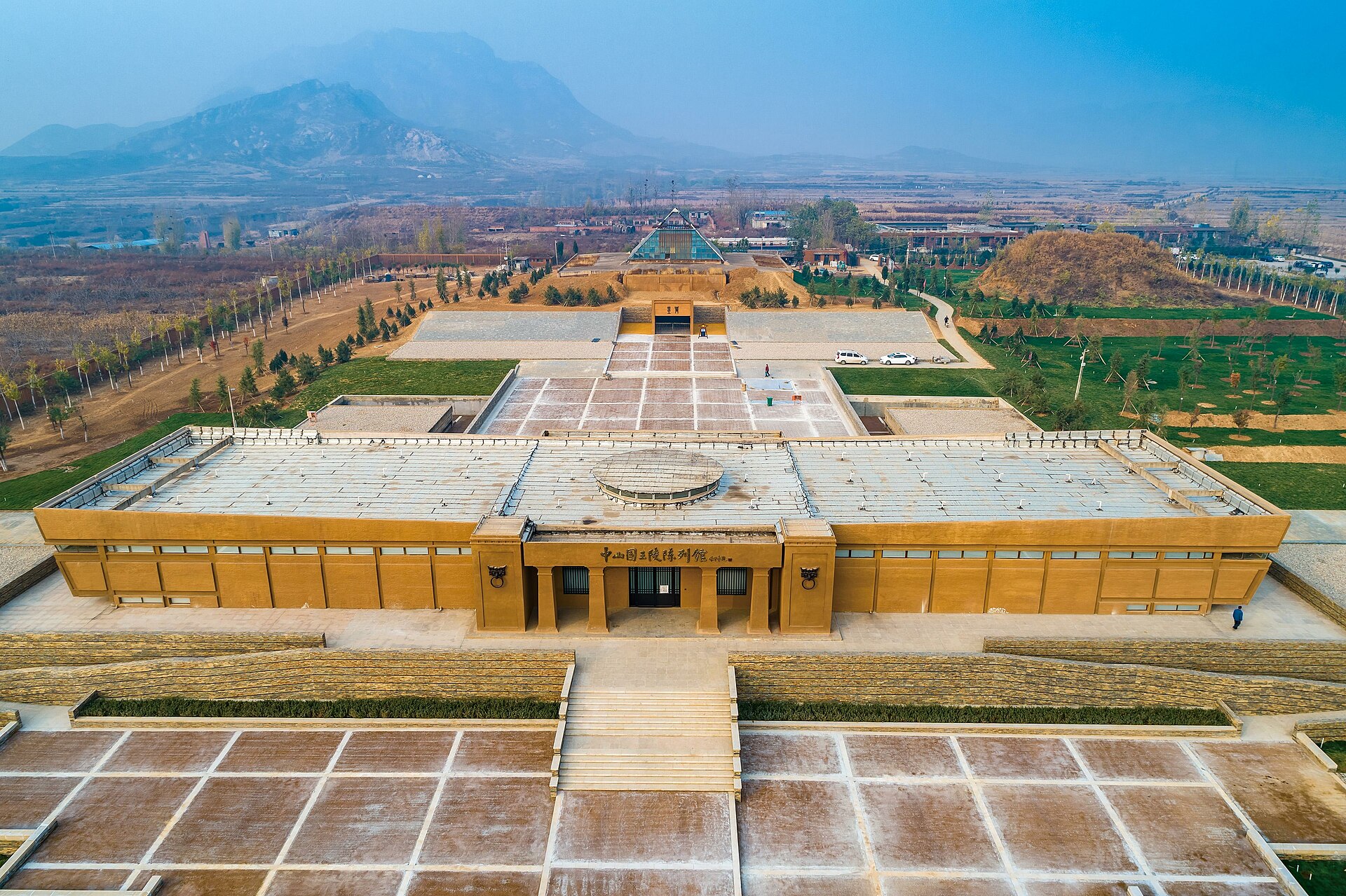 Current visitor and exhibition landscape at the Zhongshan royal-tomb site in Pingshan