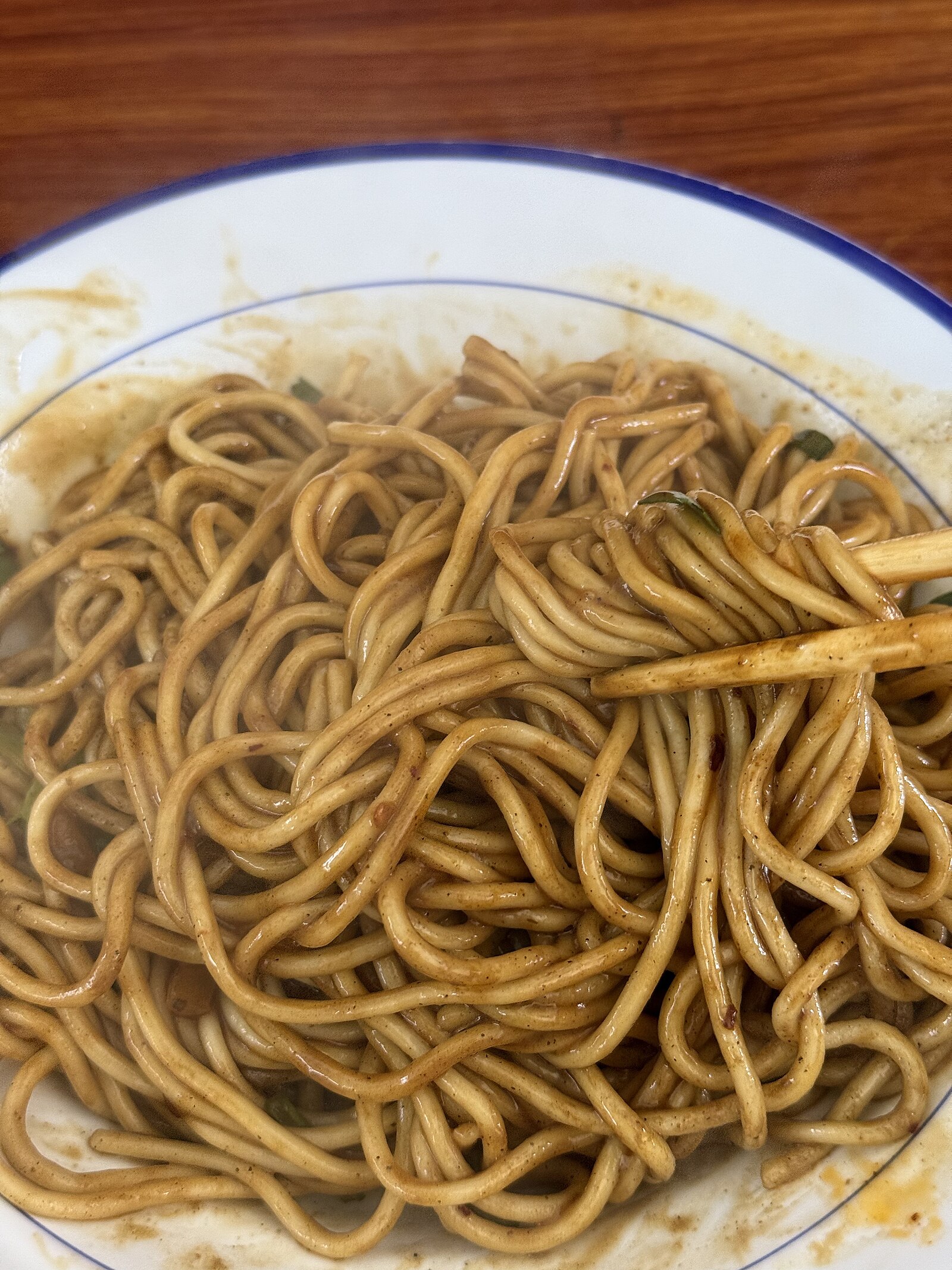 Close view of a bowl of mixed hot-dry noodles