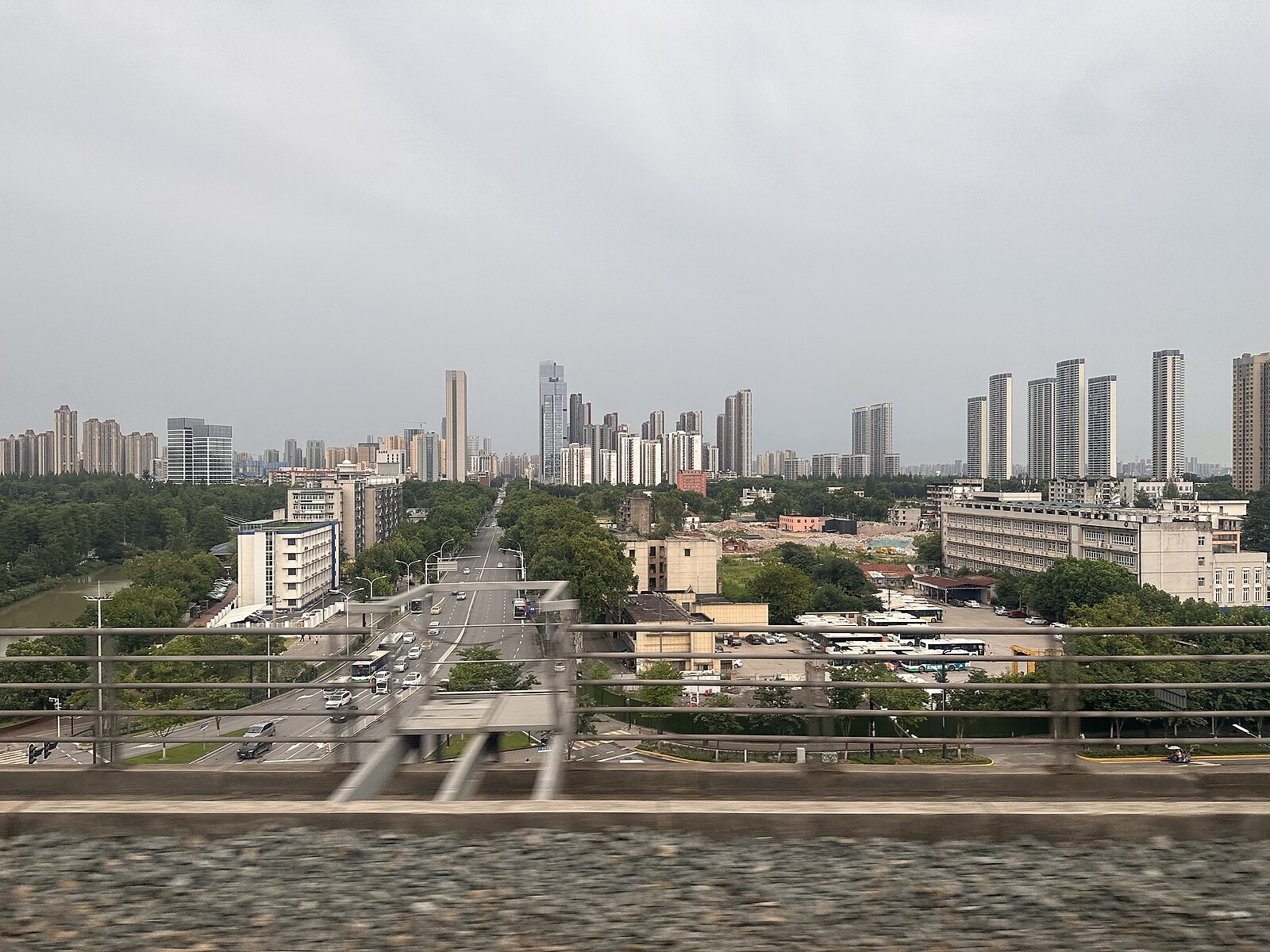 Qingshan District cityscape viewed from a train