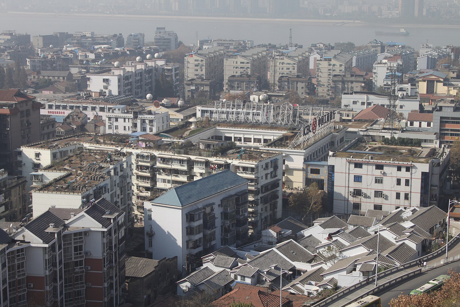 Dense Wuchang roofs with the Yangtze in the distance