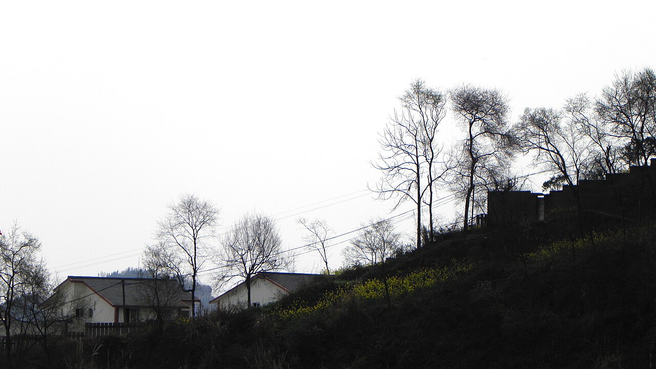 Dated rural hillside settlement in Anyue County
